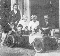 Gustave Maclure - the ex-Rolls Royce and Riley engineer and his family. Sons Edgar and younger brother Percy were successful racing drivers. In front is Percy Maclure and his 'Baby Riley' that he drove to a track record at Donington in 1930 aged just 10.